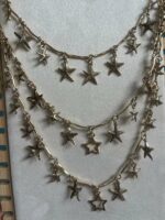 Collar triple estrellas