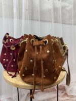 Bolso saquito piel vuelta