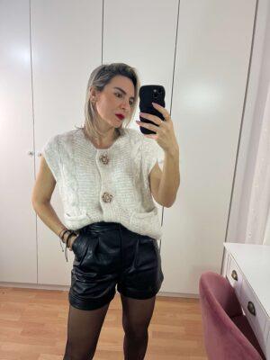 Chaleco punto botón flor