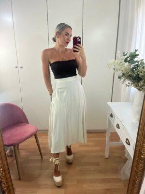 Falda midi con bolsillos